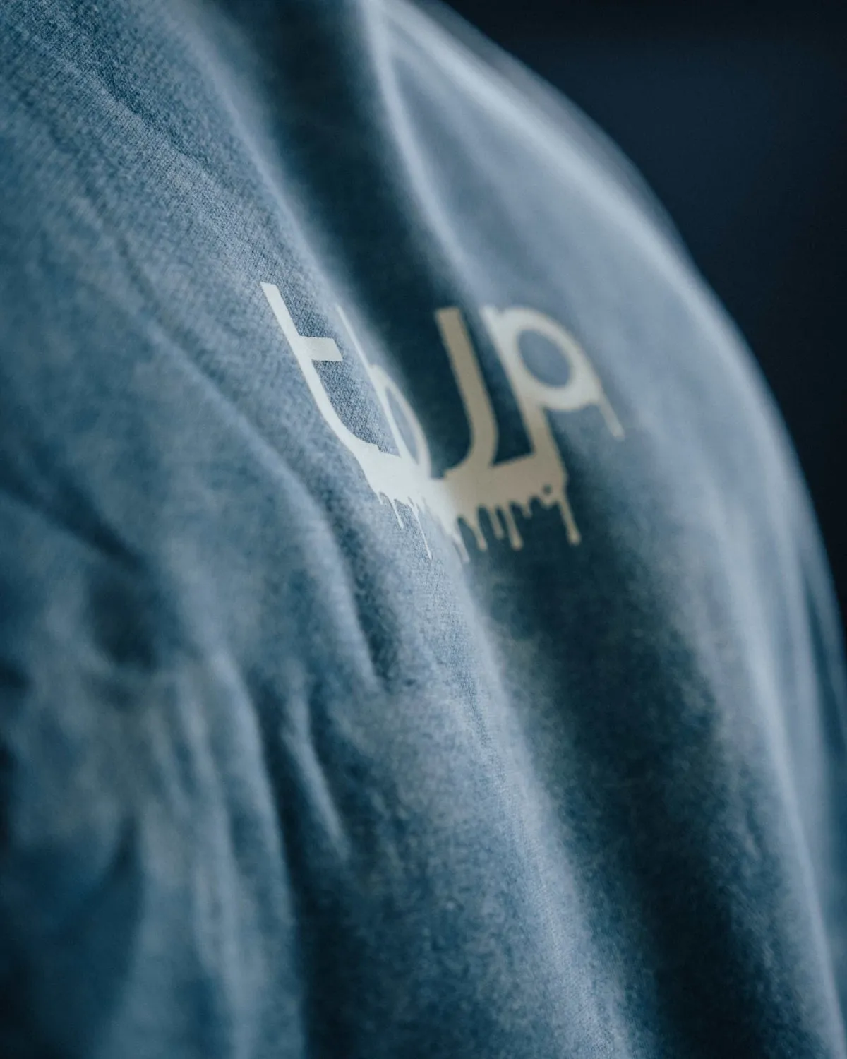 Trained by JP Drip Logo sweater blågrøn cream logo