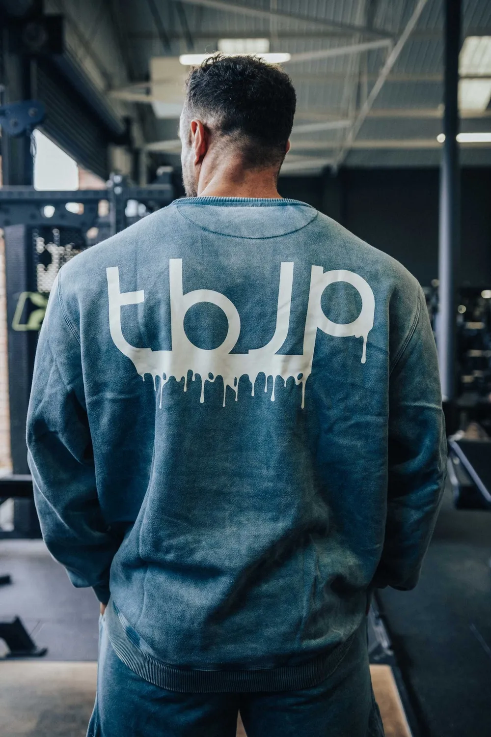 Trained by JP Drip Logo sweater blågrøn cream logo